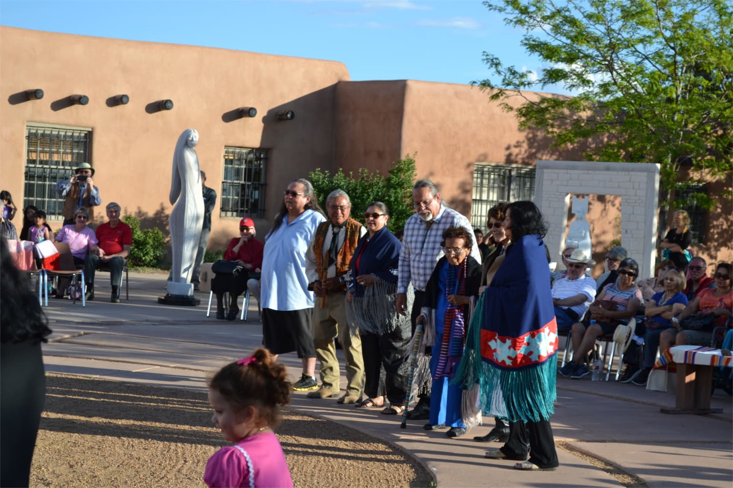 Anna Maria and family taking a tour in the Round Dance.