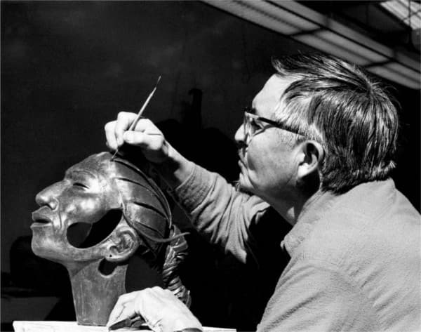Allan Houser working on a bronze sculpture.