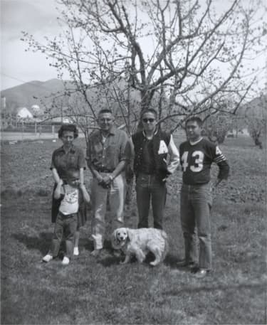 Anna Marie, youngest son Stephen, Allan, Bob, Phillip and dog Bully. 1962. Houser family archive.
