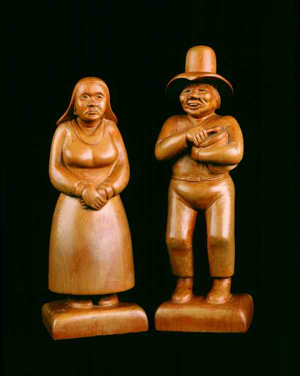 Allan Houser's first Pine carvings of Apache Dancers height 9.5". Circa 1941. Image: Houser family archive.