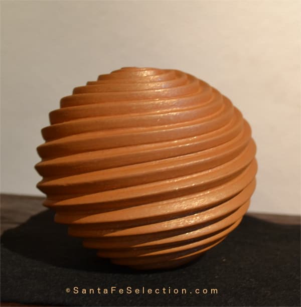 Dominique Toya - Jemez Pueblo. Finished Seed Pot. The special mica clay blend that she gathers from her home casts a glow to the perfectly carved piece.