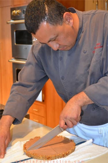 Chef Cano slicing the Spicy Mexican Chocolate Sauce.