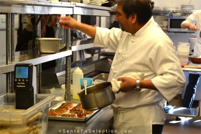 Chef Martin Rios preparing Salmon dishes for the group.