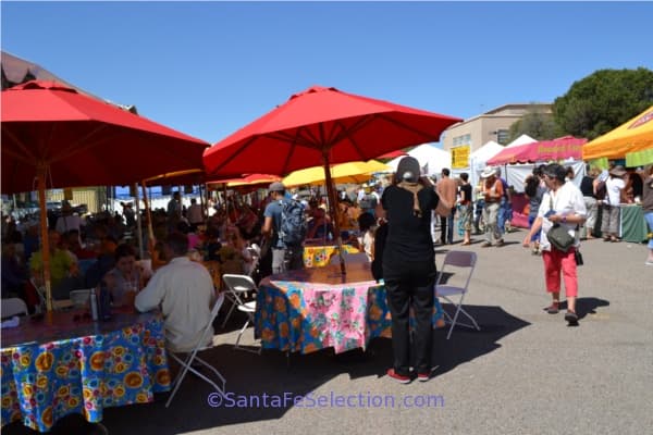 Food booths and shade umbrellas provide a welcoming refueling station.